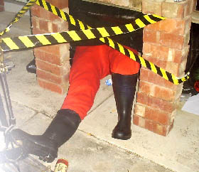 Chris' photo of Santa's legs coming out of their handbuilt chimney