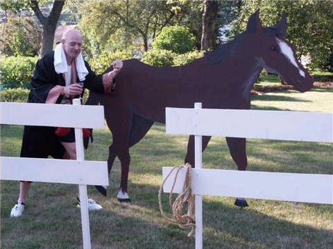 The boxer and horse