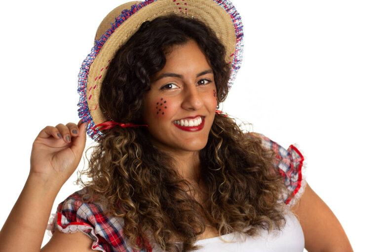 A woman in costume with styled hair for the mystery party